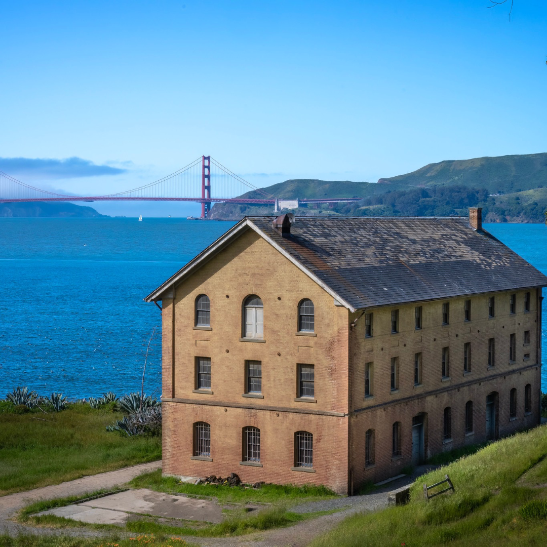 The historic Quartermaster Building at Angel Island State Park overlooks San Francisco Bay and the Golden Gate Bridge. 
